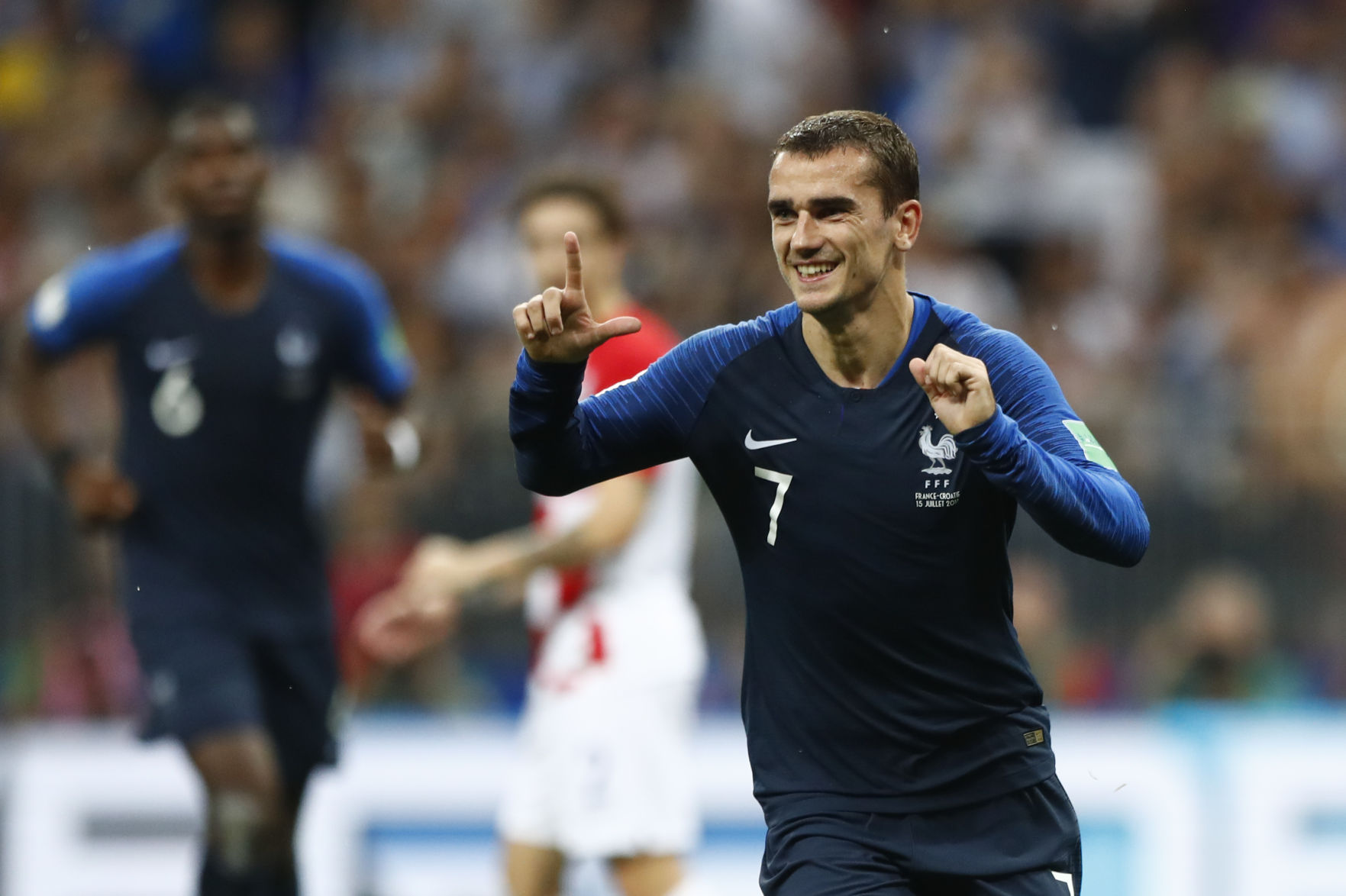 France's Antoine Griezmann celebrates